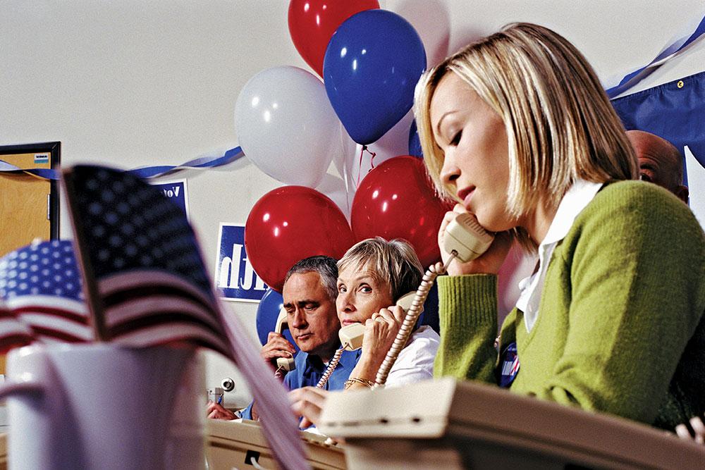 Political science students making phone calls for campaign